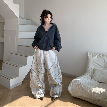 05 舊草解構拼接 彎刀丹寧褲