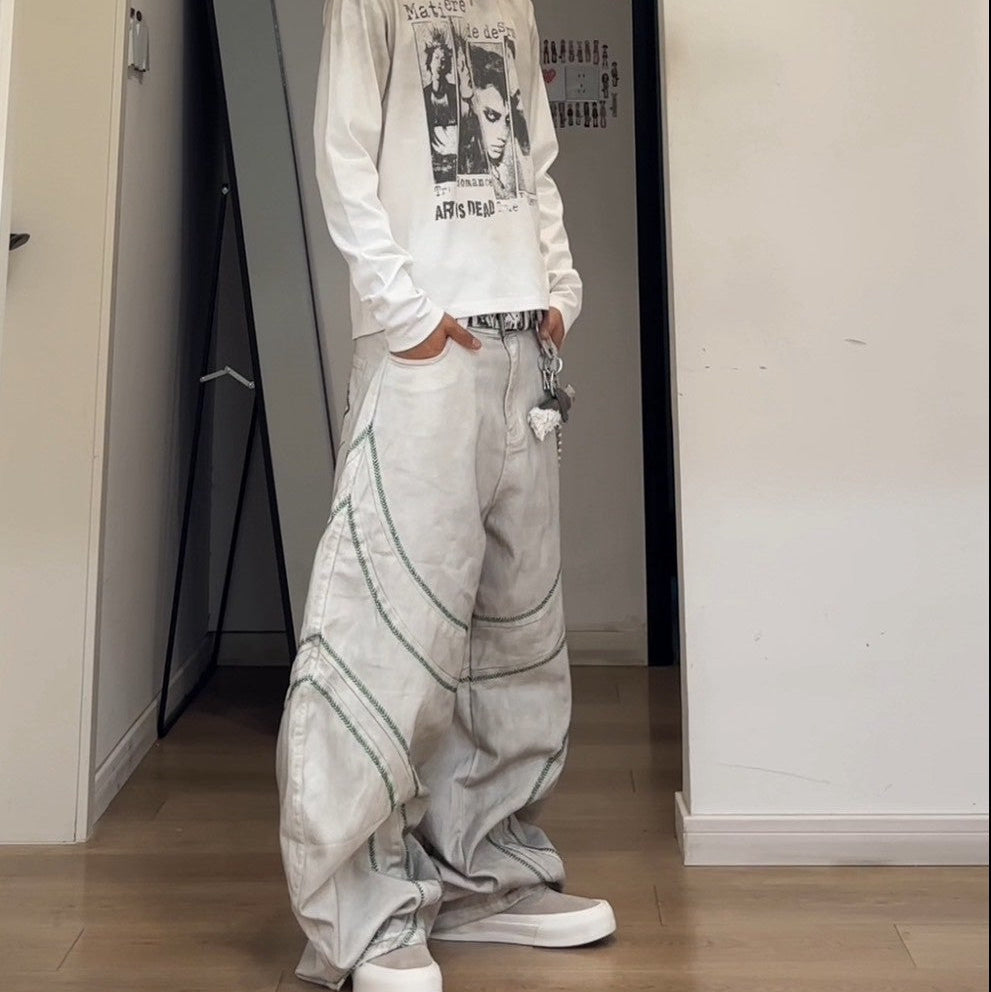 05 舊草解構拼接 彎刀丹寧褲