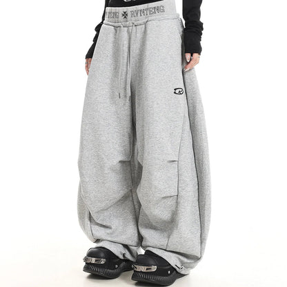 美式 解構刺繡彎刀棉褲